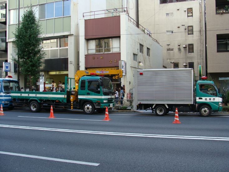 Hino and Isuzu trucks Tokyo police
