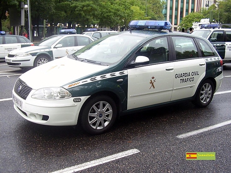 Ed Spanish Traffic Police Fiat Croma parked on the road amongst others 