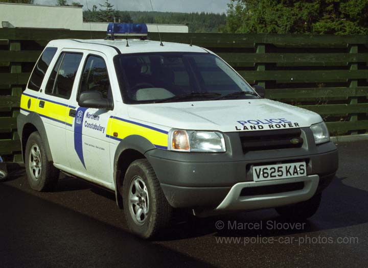 land rover police car
