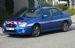 Blue Subaru Impreza GT.
